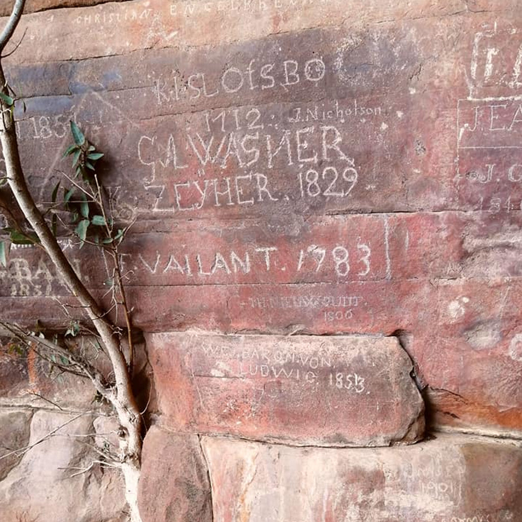 A photo of the Heerenlogement Cave with its ancient carvings