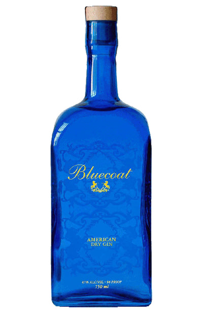 Blue bottle of Bluecoat American Dry Gin on a white background