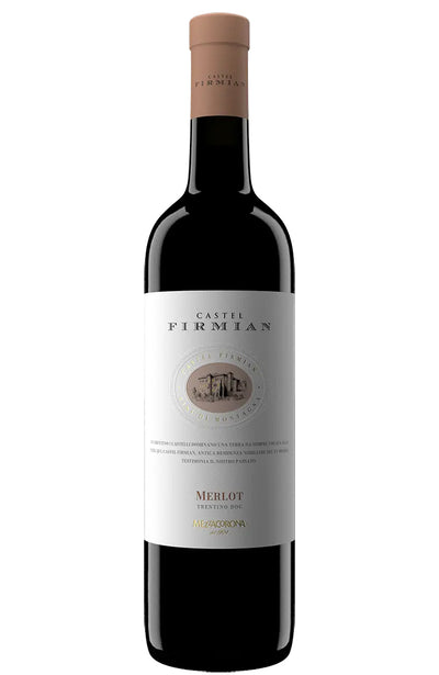 A bottle of Castel Firmian Merlot red wine, featuring a dark glass bottle, a white label with gold and black text, and a light brown paper capsule at the top, shown against a plain white background.