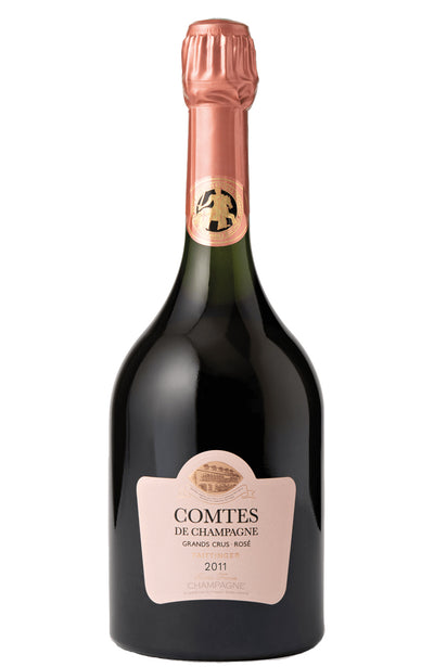 Bottle of Comtes de Champagne Rosé wine on a white background