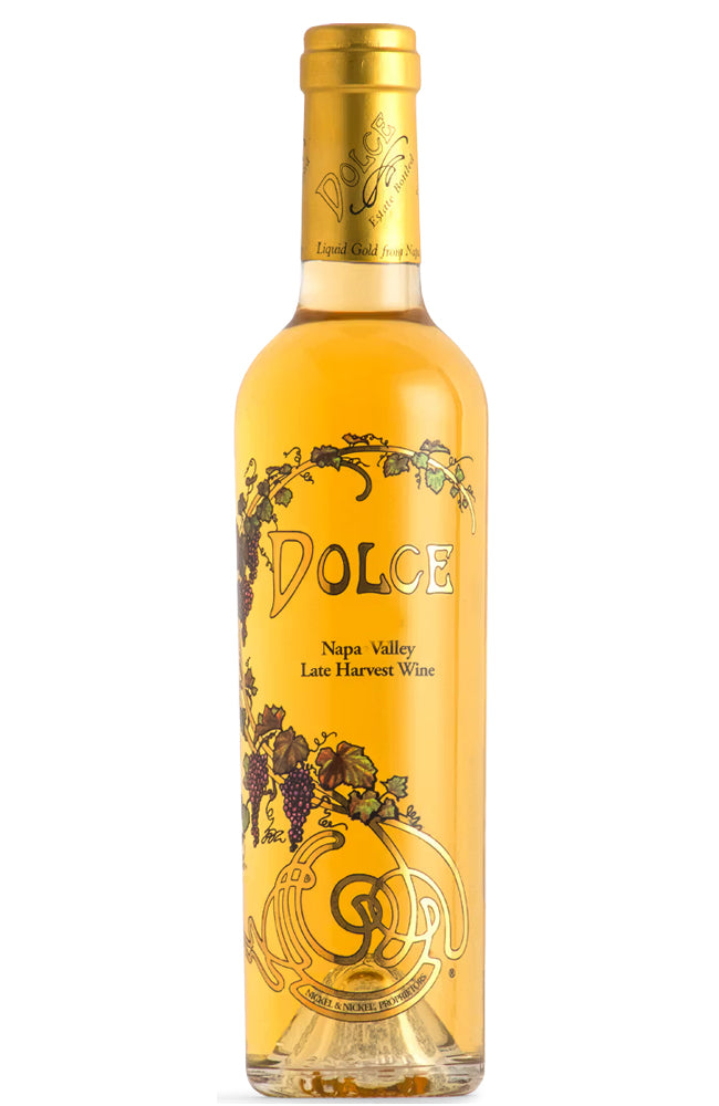 Far Niente Dolce wine bottle with gold cap and label on a white background