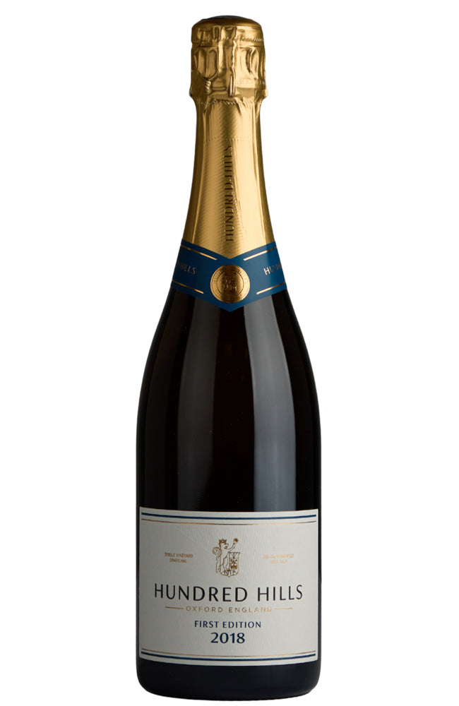 Bottle of Hundred Hills First Edition 2018 sparkling wine with gold foil cap on a white background