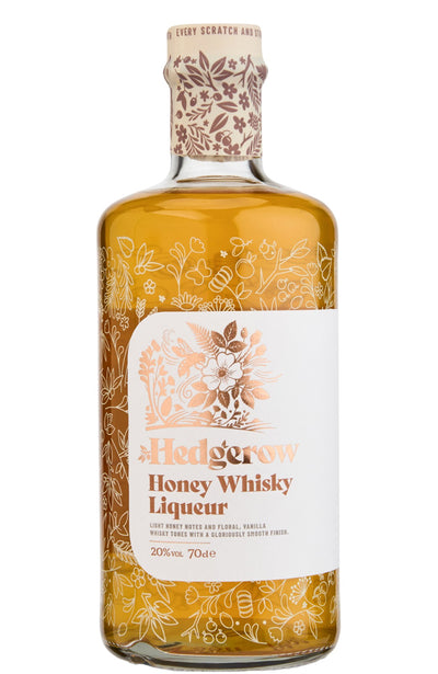 A bottle of Hedgerow Honey Whisky Liqueur with a white label and floral illustrations, filled with golden amber liquid, on a white background.