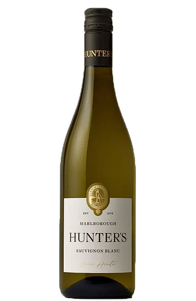 A bottle of Hunter's Marlborough Sauvignon Blanc white wine, featuring a dark green glass bottle with a cream and gold label, set against a plain white background.