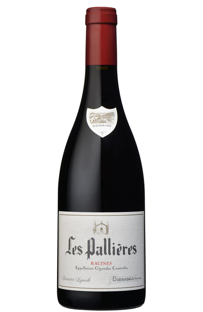 A bottle of Les Pallières Racines red wine, featuring a dark glass bottle with a red wax seal and a white label with black gothic lettering, set against a plain white background.
