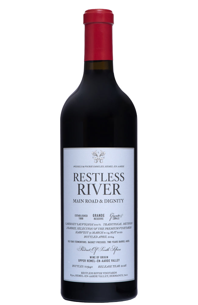 A bottle of Restless River Main Road & Dignity red wine, featuring a dark glass bottle with a red wax seal and a white label with black text, set against a plain white background.