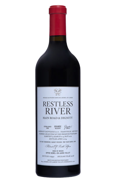 A bottle of Restless River Main Road & Dignity red wine, featuring a dark glass bottle with a red wax seal and a white label with black text, set against a plain white background.