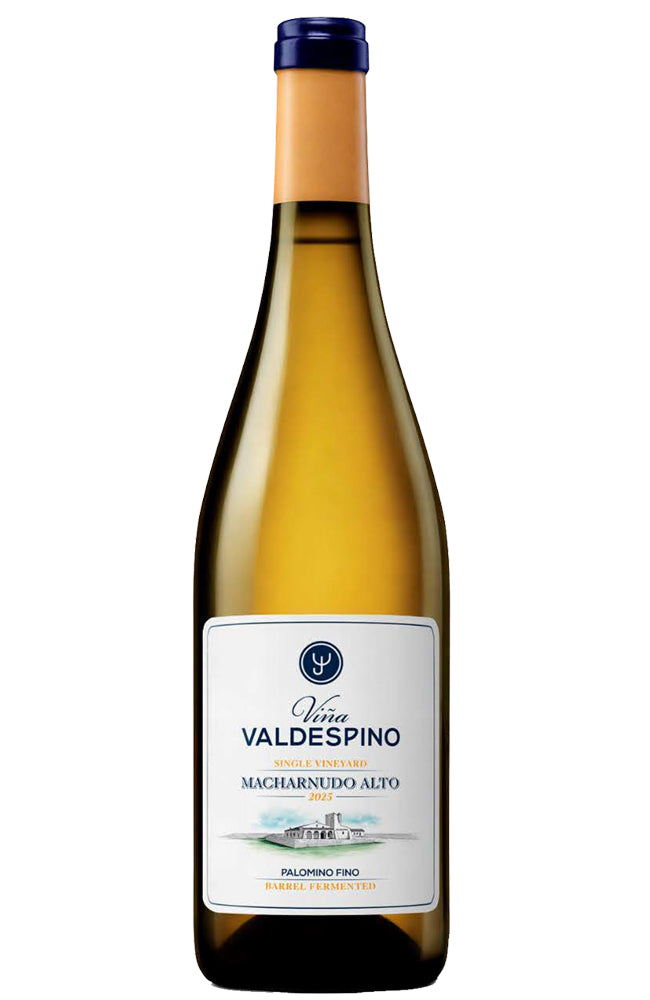 A bottle of Viña Valdespino Macharnudo Alto single vineyard barrel fermented white wine, featuring a pale golden-amber liquid, a white label with blue and gold text, and a dark blue cap, isolated on a white background.