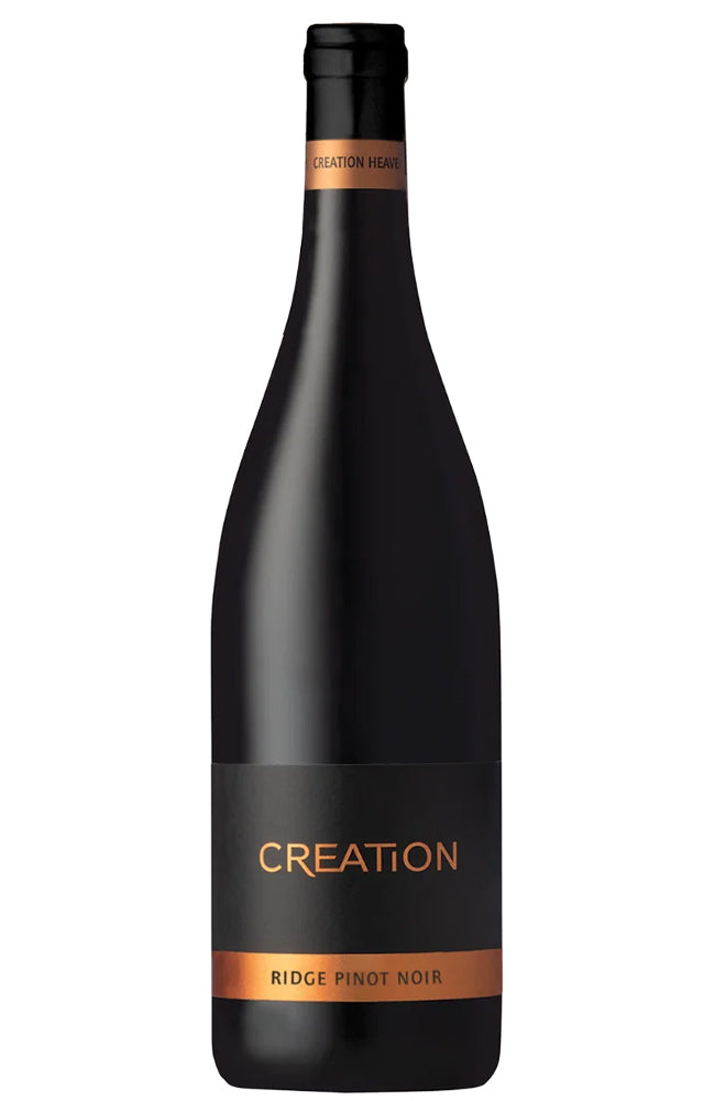 A bottle of Creation Ridge Pinot Noir red wine, featuring a matte black bottle with a black label and metallic copper accents, set against a plain white background.
