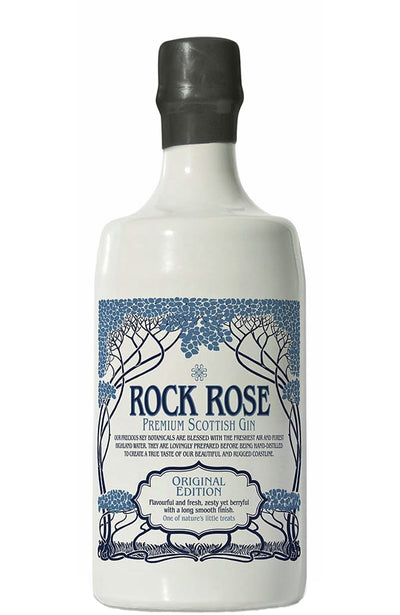 A bottle of Rock Rose Premium Scottish Gin with a white body, a black cap, and a blue and white label featuring tree illustrations.