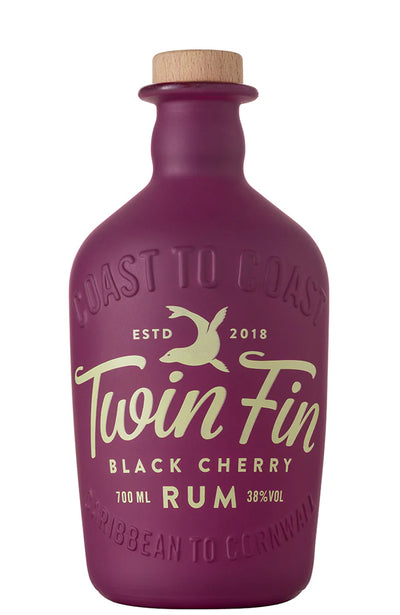 Purple bottle of Twin Fin Black Cherry Rum with a cork cap on a white background