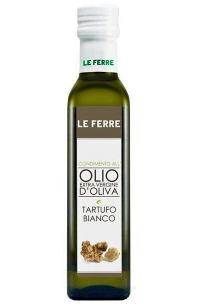 Bottle of Le Ferre Tartufo Bianco Olive Oil with white label on a white background